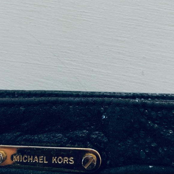 Michael Kors Black
Python Embossed
Leather Clutch - Picture 3 of 10